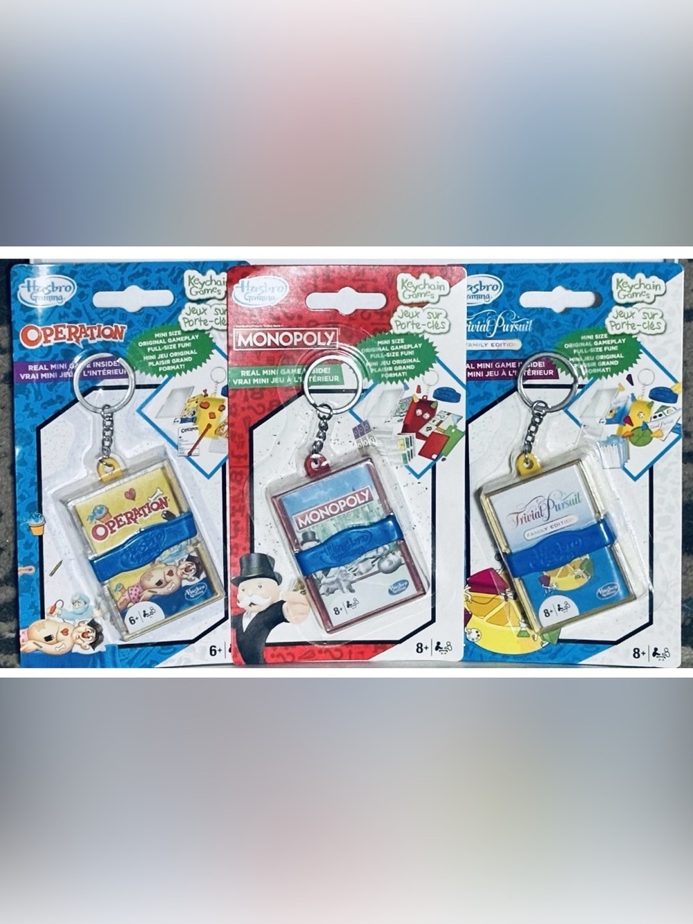Hasbro Set of Micro Games on Keychains: Operation, Monopoly & Trivial Pursuit